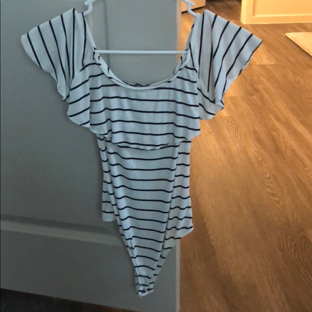 Off the shoulder body suit.